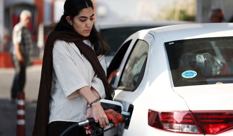 Iran increases gasoline price for its heaviest consumers as economy struggles