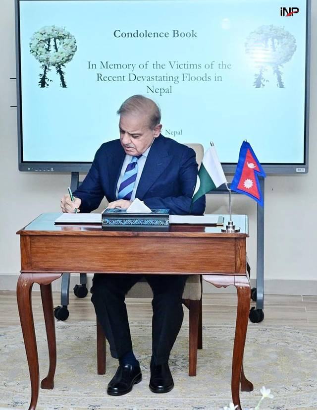 PM visits Nepal embassy, signs condolence book for flood victims