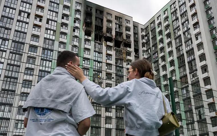 Russian strikes kill 12 in Kyiv, outskirts
